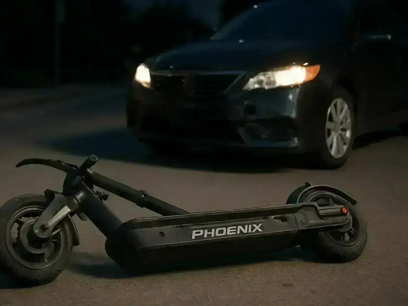 Phoenix e-scooter accident lawyer reviewing crash evidence near Roosevelt Row in downtown Phoenix